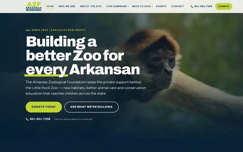 Arkansas Zoological Foundation website by WebJIVE on a laptop